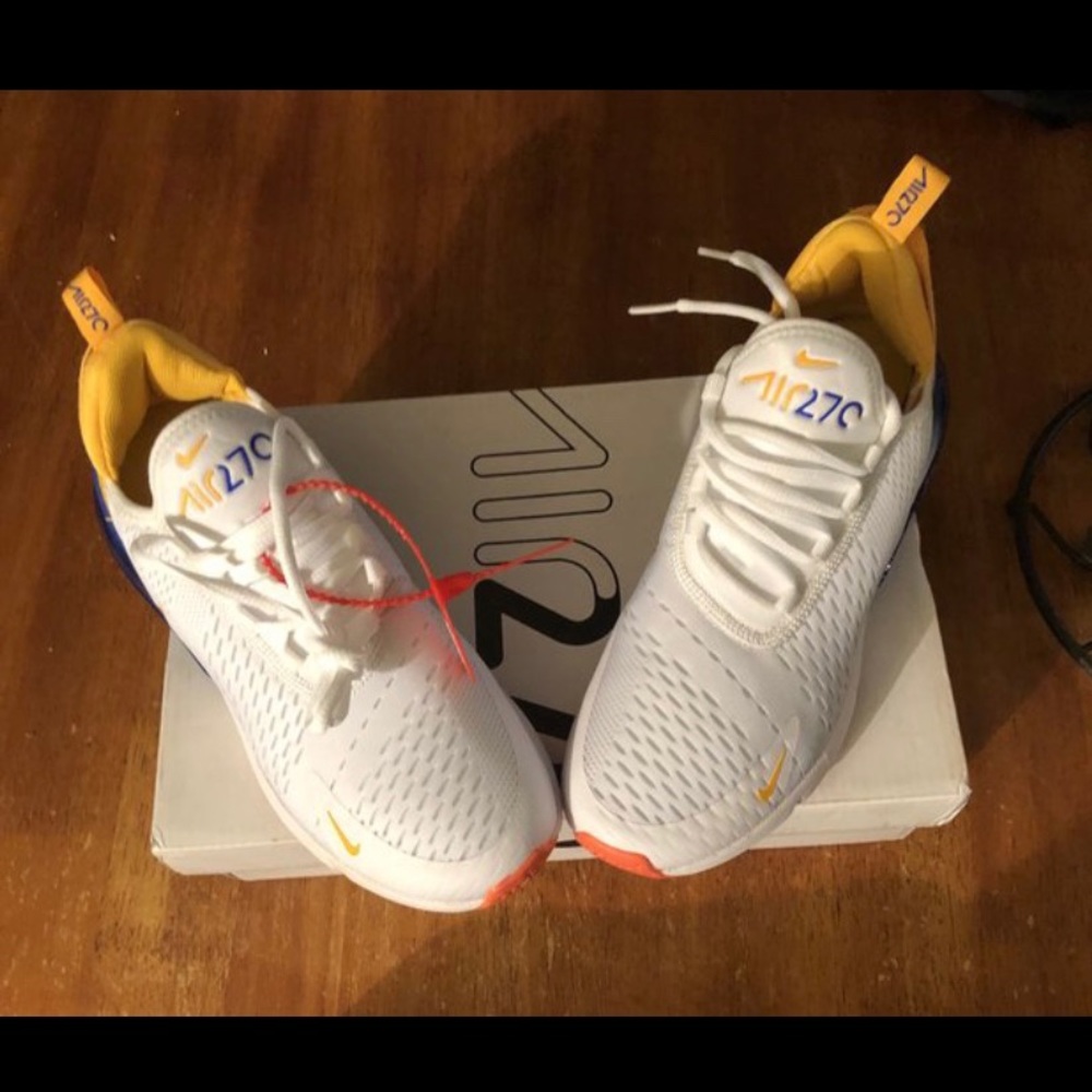 Yellow blue white running shoes